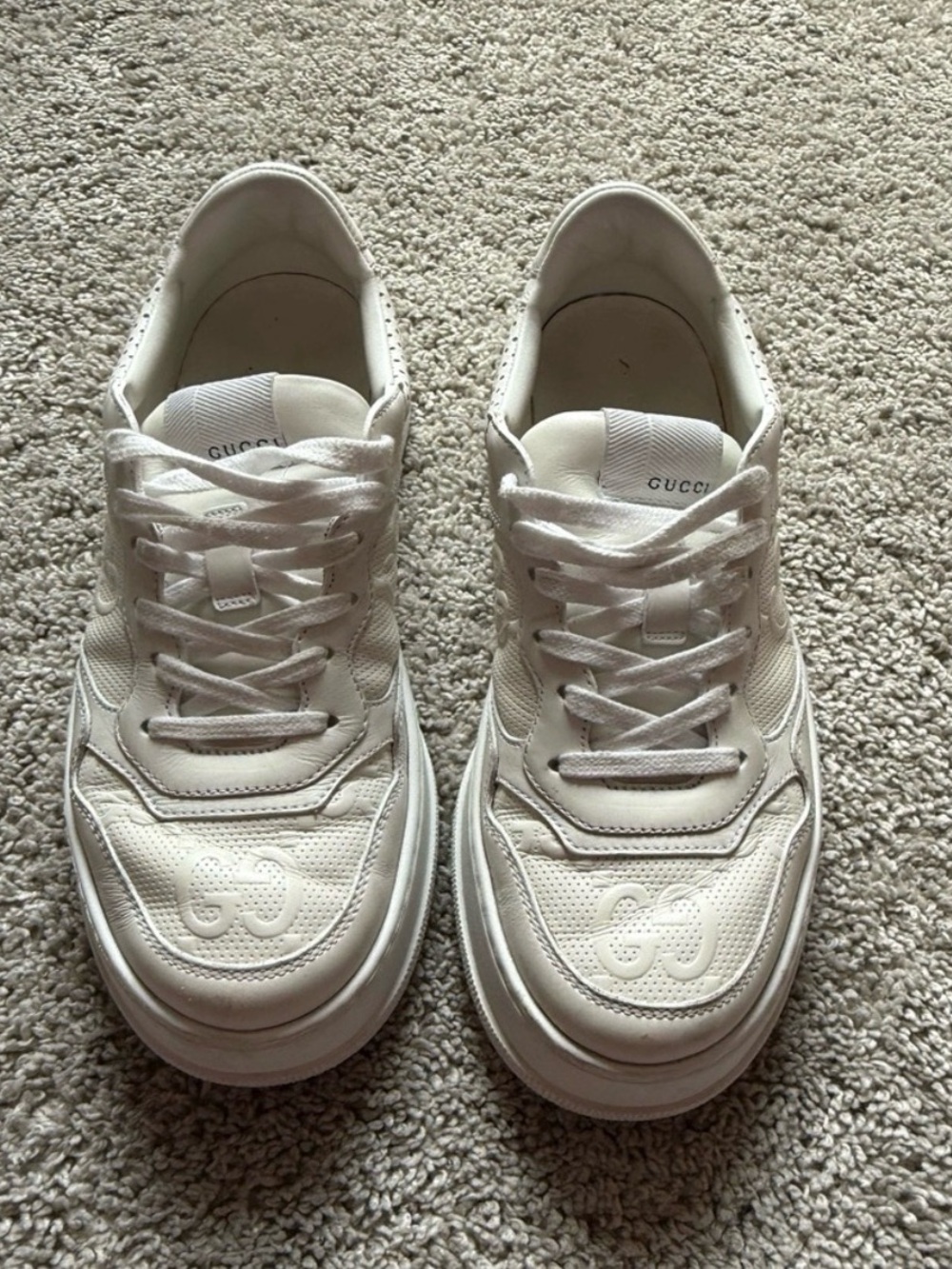 Gucci WOMEN'S GG EMBOSSED SNEAKER